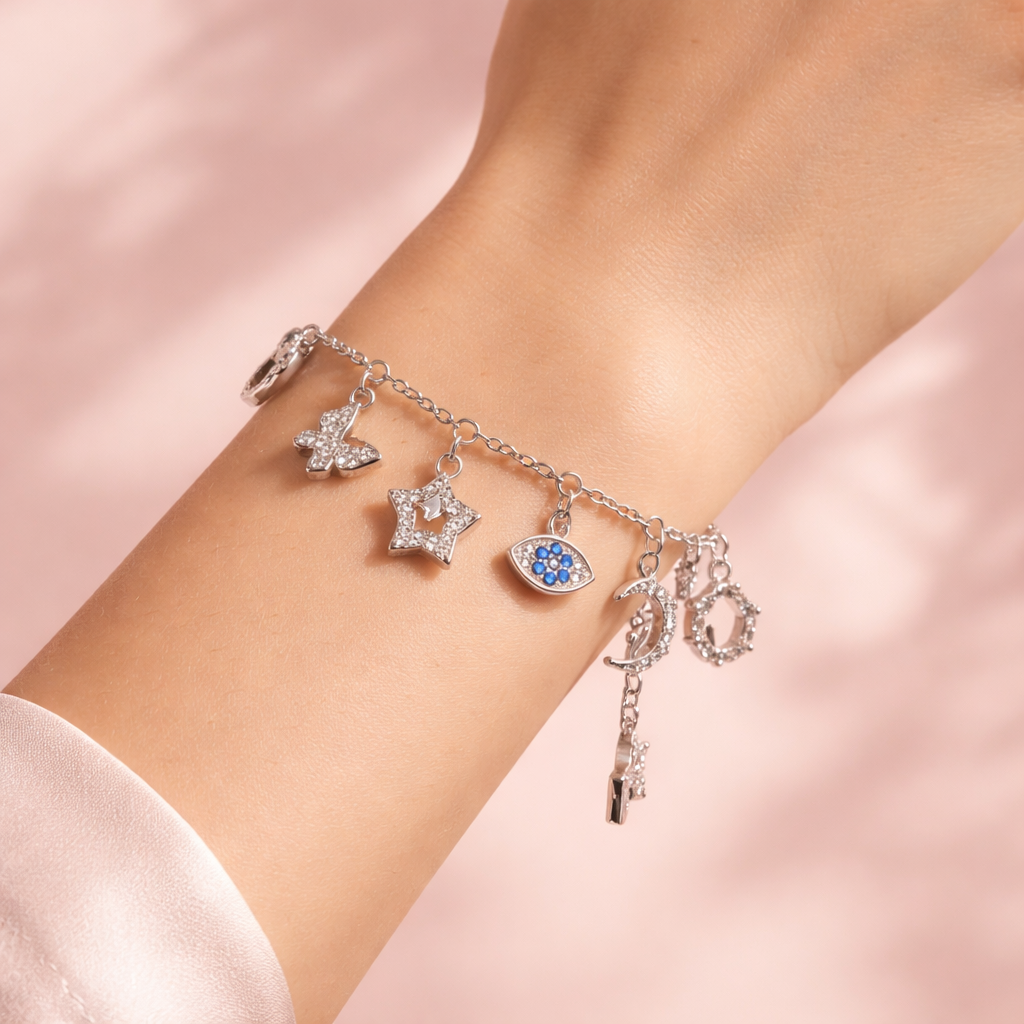 Silver Multi-Charm – Adjustable Star, Moon & Clover Charm Bracelet with Blue CZ Stones - Arshia Creations