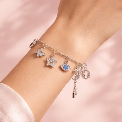 Silver Multi-Charm – Adjustable Star, Moon & Clover Charm Bracelet with Blue CZ Stones - Arshia Creations